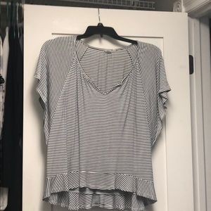 Black and white striped short-sleeved top.